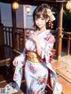 A woman in a kimono standing on a wooden deck.